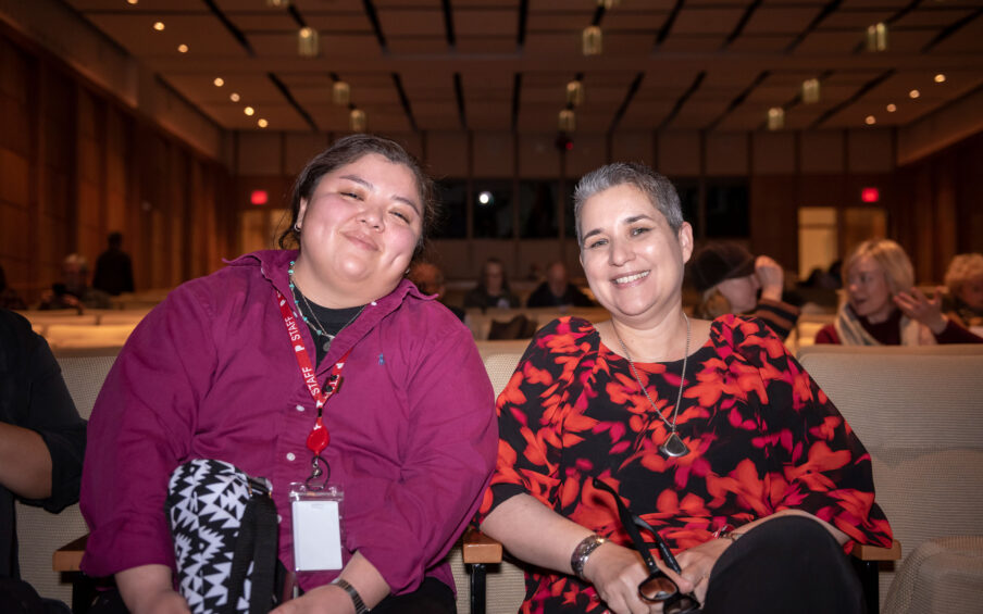Two smiling women