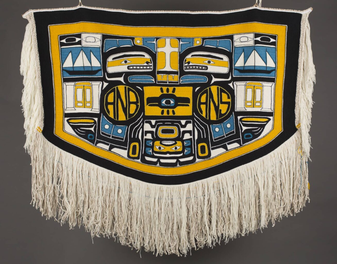 A Native American robe displayed flat.